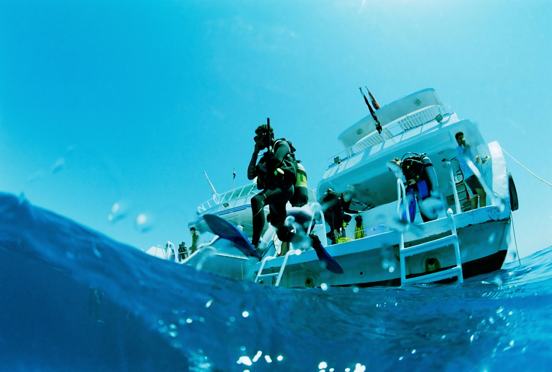 Diver jumping in the water